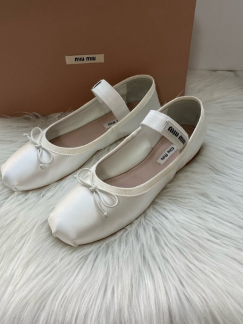 Miu Miu Cream Flats with Bow Accent